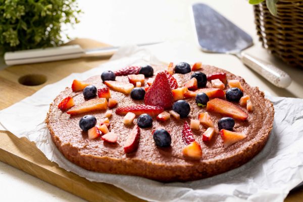 Tarta de queso vegana con frutos rojos